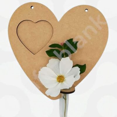 A Heart Photo Frame with Bud Vase made from MDF, featuring a 7cm heart-shaped photo insert and a small silicone vase to add a flower