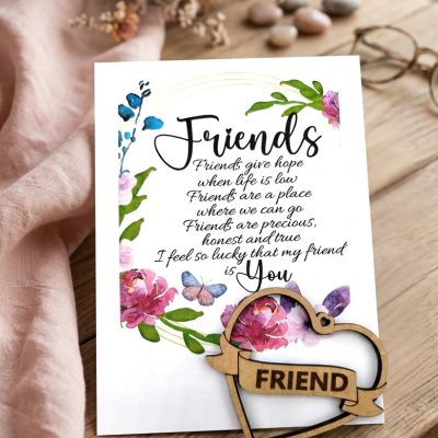 Finished Friends Floral Heart Keepsake Card showing the printed floral verse card with the laser-cut wooden friend heart token laid on top.