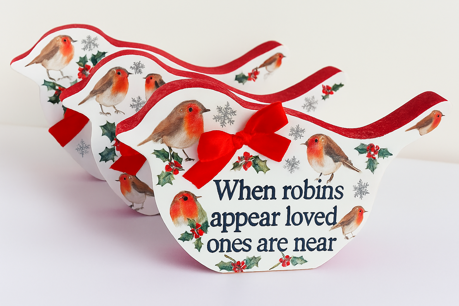 Three wooden robin-s