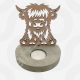 A Highland Cow Tealight Holder made from detailed 4mm laser-cut MDF, featuring a sturdy 18mm base with a 4.2cm hole for an LED tealight.
