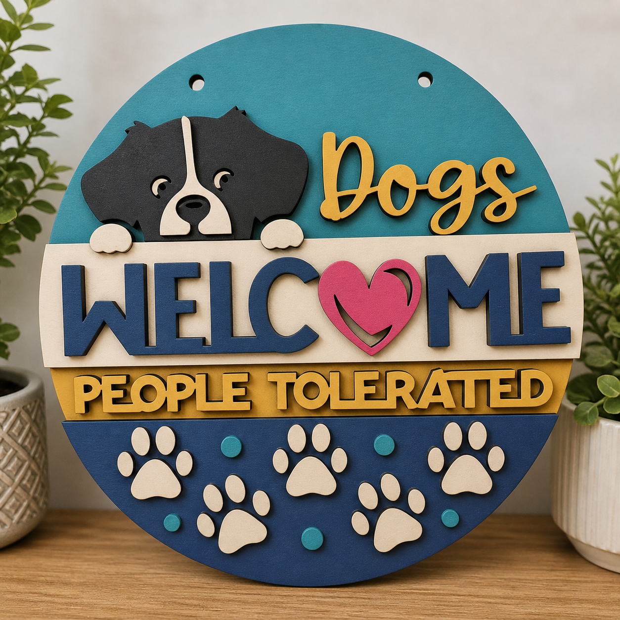 A Dogs Welcome Hanging Layered Plaque made from 4mm MDF, featuring the text "Dogs Welcome People Tolerated" and a separate peeking dog shape for a 3D effect.