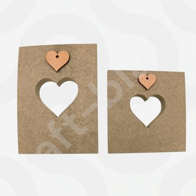 Two unfinished Freestanding Heart Cut-Out Plaques in different sizes, made from 18mm thick MDF with a central heart-shaped hole and a separate small heart charm.