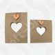 Two unfinished Freestanding Heart Cut-Out Plaques in different sizes, made from 18mm thick MDF with a central heart-shaped hole and a separate small heart charm.