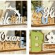 Four different Freestanding Summer Table Signs made from 4mm MDF, showing layered 3D designs of summer themes on a two-piece base.