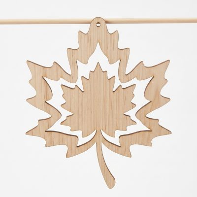 The Large Maple Leaf Hanging Plaque cut from 4mm MDF, showing the 20x20cm leaf shape with an 8x9.5cm open center space and top hanging hole.