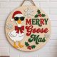 Finished Merry Goosemas Door Hanger displaying a 20cm layered wooden plaque with a painted goose in a Santa hat, bow tie, and sunglasses next to "Merry Goose-Mas" lettering.